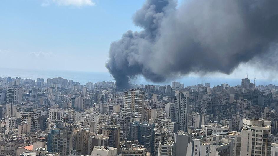 Smoke rises over the Lebanese capital Beirut in the aftermath of an airstrike.