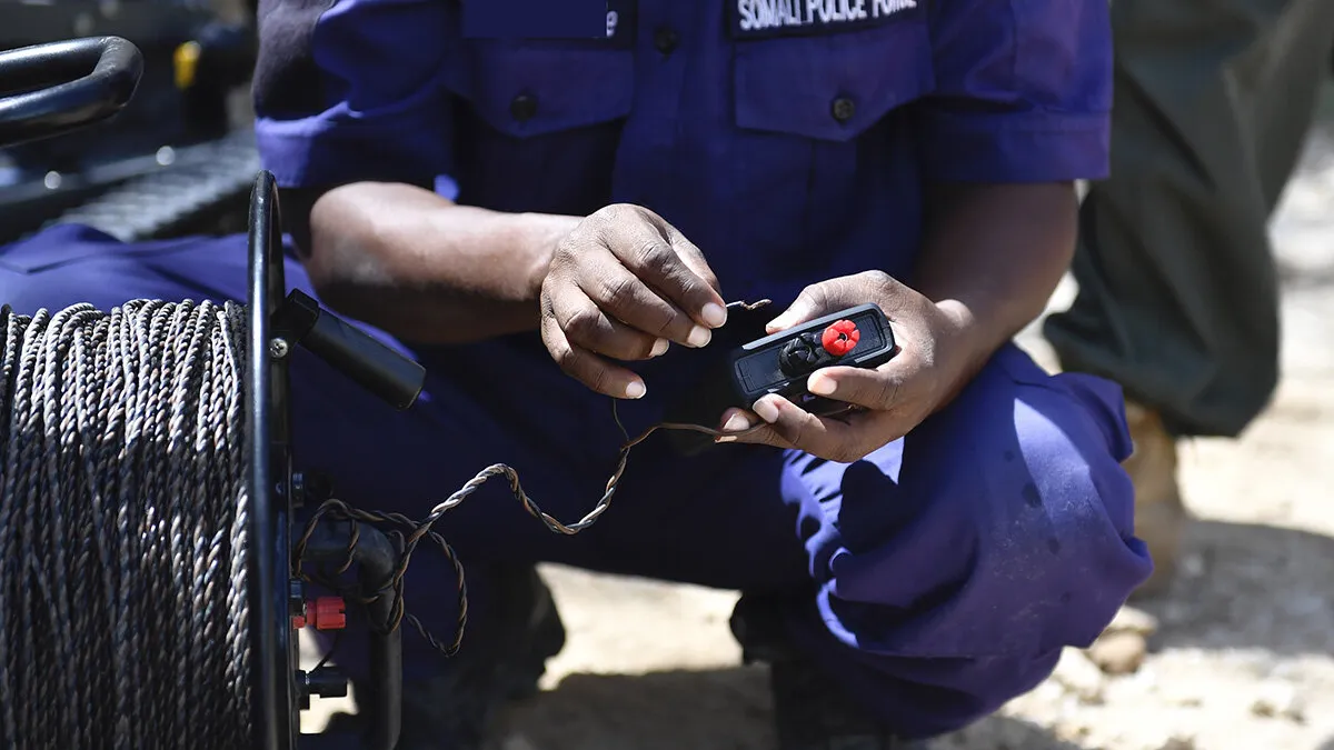 A Somali Police Force officer undergoes demolition training provided by UNMAS.