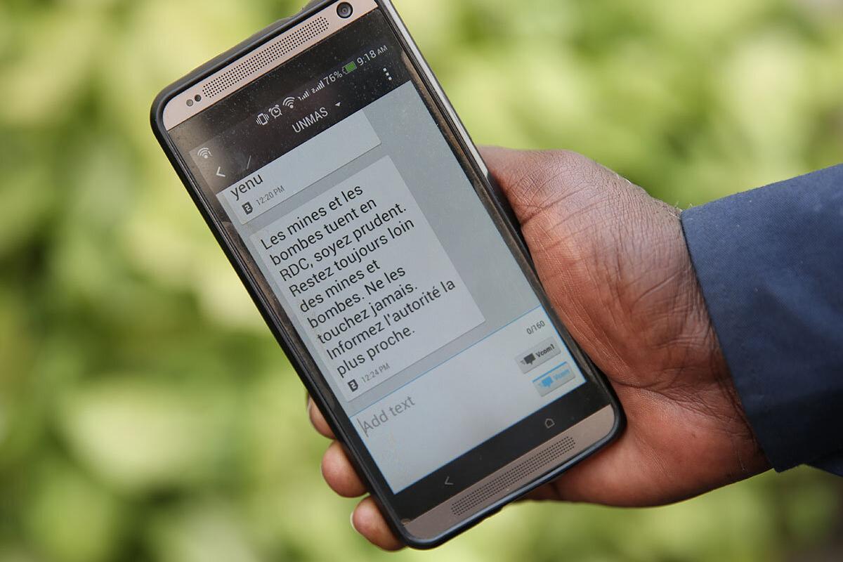 a phone screen showing mine awareness text message