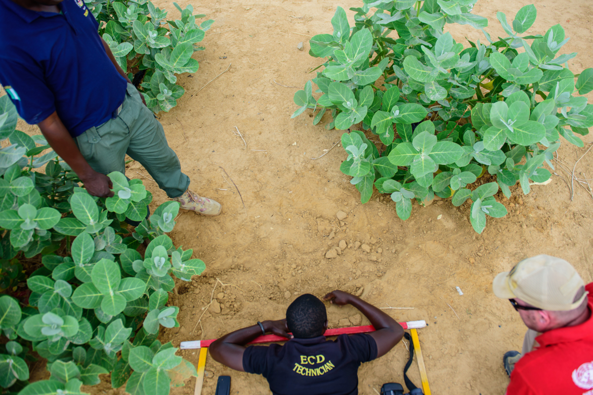 A Nigerian police officer demonstrates a manual search drill to locate explosive ordnance as part of a German-funded UNMAS IED disposal training in Maiduguri State Capital, Borno State, Nigeria.