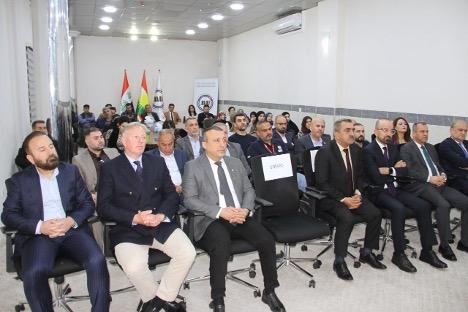 people sitting down looking at one direction