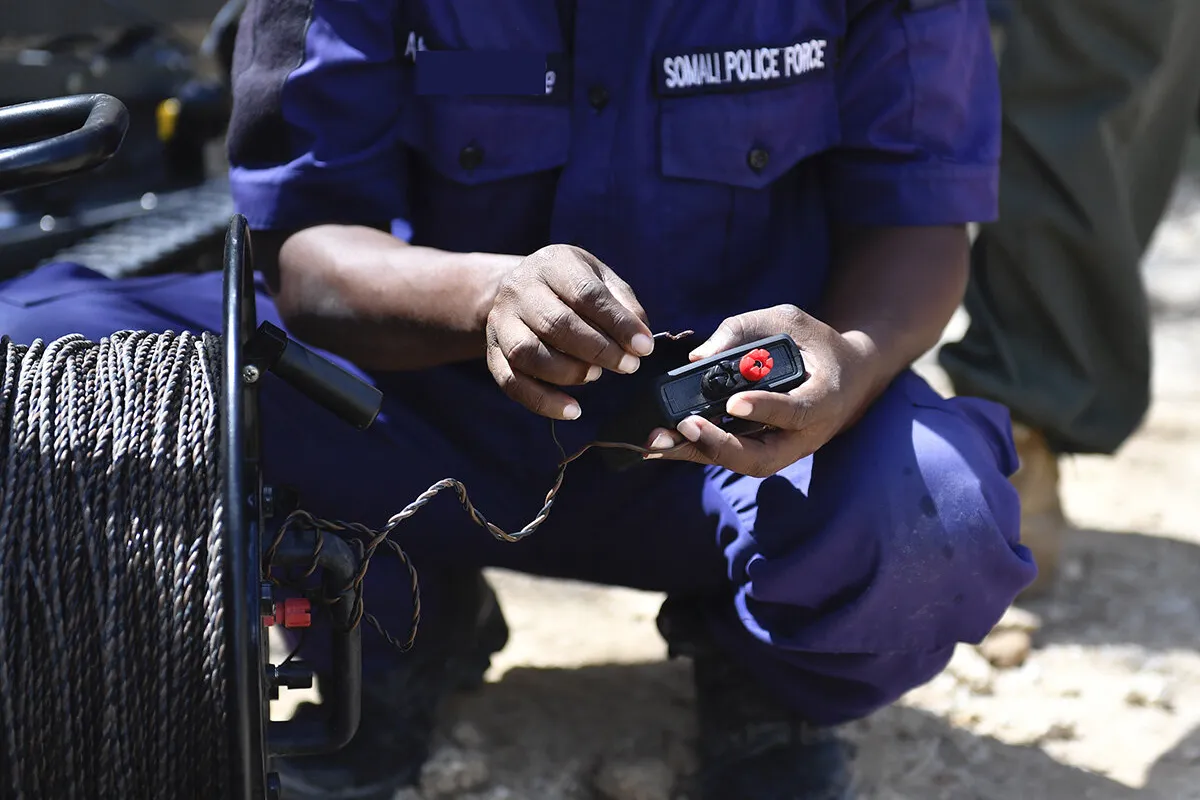 A Somali Police Force officer undergoes demolition training provided by UNMAS.
