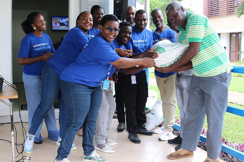 UNFCU Staff hand  over fertilizers