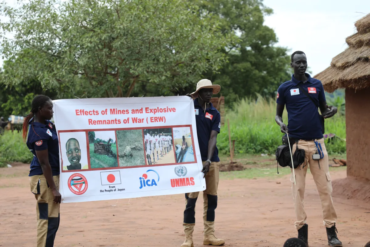 NMAA Survey and EORE team members conduct an EORE session in Odemo Village as part of their operational deployment.