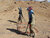 Two female deminers searching for sub-surface explosive remnants of war in Bamyan in 2018. © UNMAS