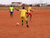 Youth playing football on a recently cleared parcel of land, as part of the UNMAS “Safe Ground” campaign. Photo: UNMAS Somalia