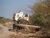 A deminer uses a mine-protected vehicle to clear routes of explosive ordnance in Unity, South Sudan. ©️ UNMAS/Martine Perret