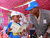 A risk education trainer interacts with a child during a Mine Awareness event organized by the United Nations in Nyala, South Darfur. Photo: UNMAS/Bojan Vukovic